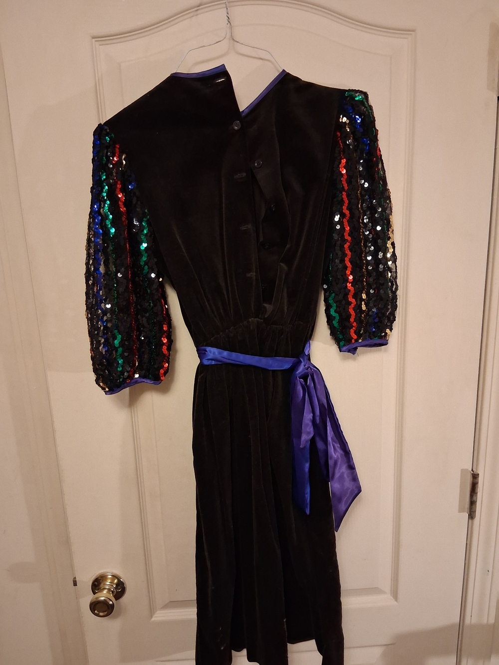 Black Velvet Dress Coat with Multicolor Sequin Sleeves.